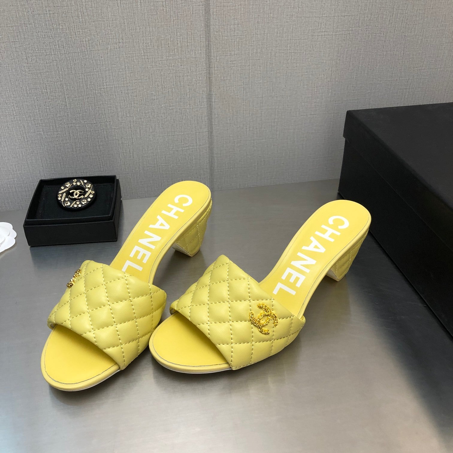 CHANEL DIAMOND-QUILTED 6 CM SANDALS IN BRIGHT YELLOW LAMBSKIN