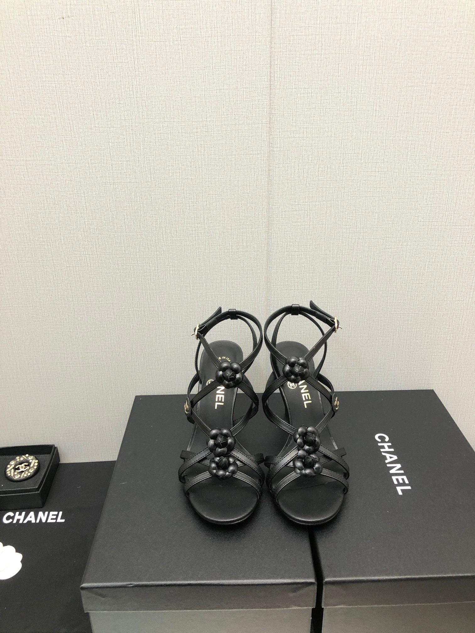 CHANEL FLORAL HIGH HEEL SANDAL IN BLACK LAMBSKIN