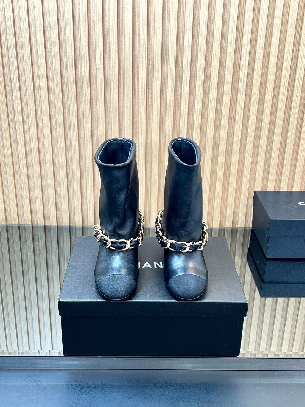 CHANEL 25S LOW BOOTS 65MM IN BLACK CALFSKIN GOLD HARDWARE